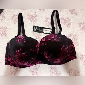 3 Size 40D bras. The tan 2 are Soma and the floral one is Torrid